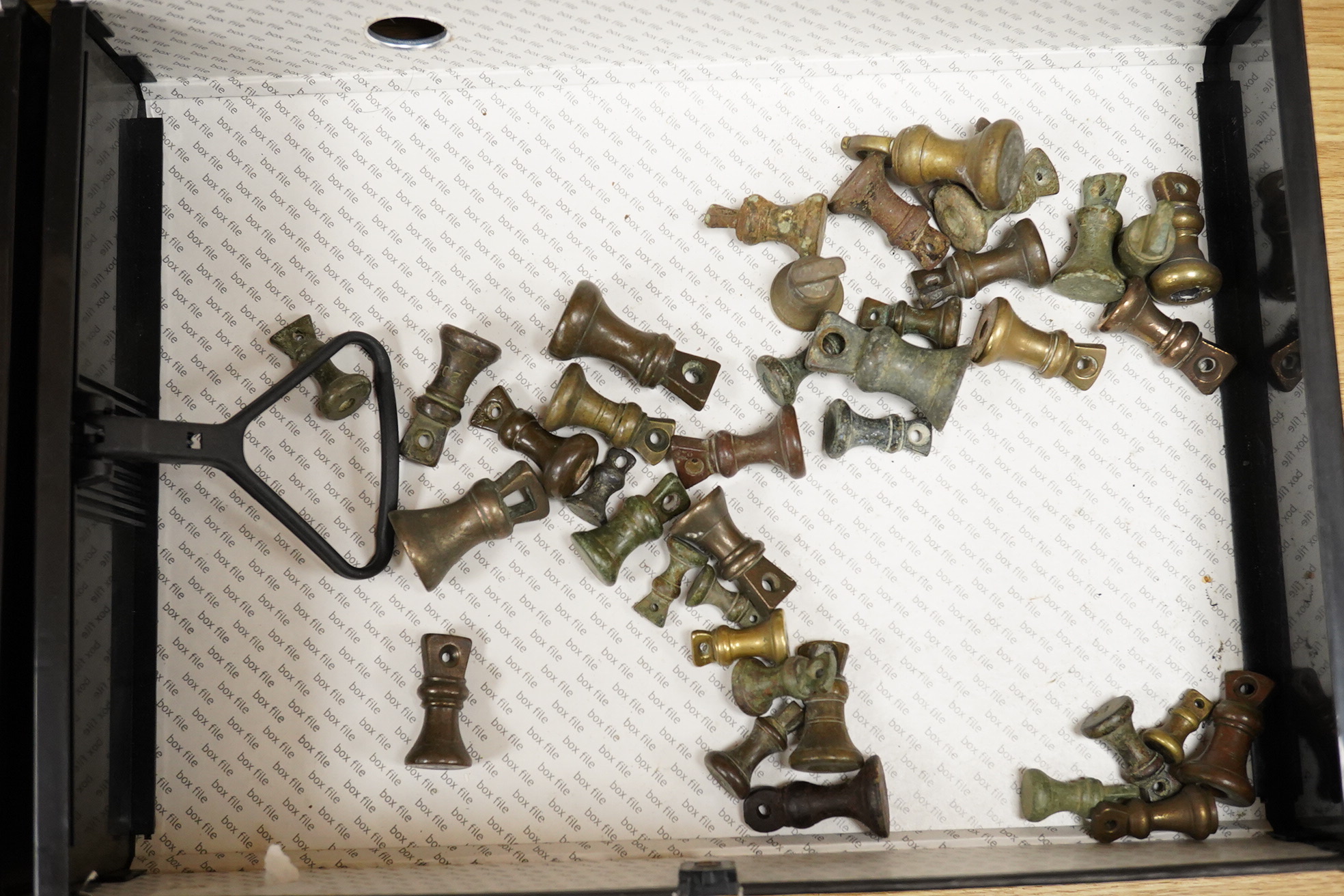 A collection of mainly 18th and 19th century bronze imperial circular trade weights and bell weights, stamped with Royal Cyphers, weights, the dagger assay mark for London, other proof marks, etc., contained within two b